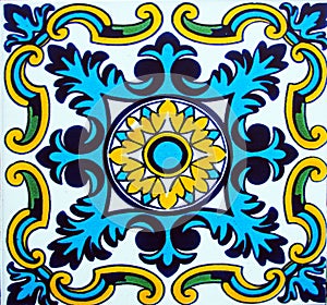 Detail of the traditional tiles from facade of old house in Valencia, Spain