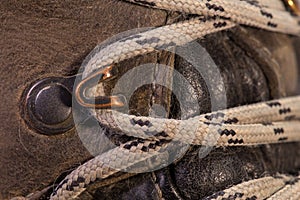 Detail of trekking shoes hook and loop.