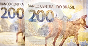 The detail of the two hundred reais bill. The real is the currency of Brazil. The Central Bank launched guidelines for the photo