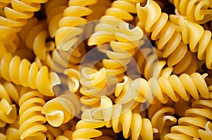 Detail of uncooked spiral pasta.