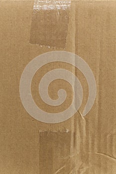 Detail of an unwritten cardboard box. photo