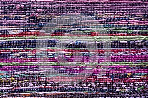 Detail of various woven fabric sewn into one canvas as background or texture