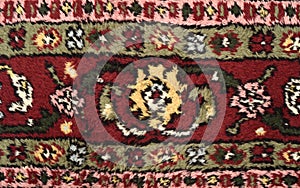 Detail of a very old Persian carpet