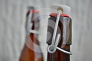 Detail view of beer bottle cap in retro design made of metal, ceramic lid and plastic sealing