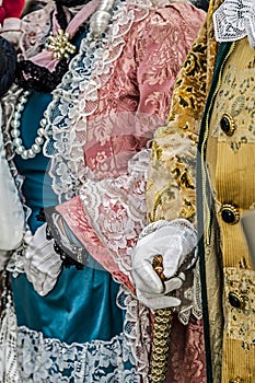 Detail view of a epoque costume at Venetian carnival 4 photo