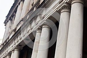 Detail view of a ionic style capital column, romanesque columns gallery