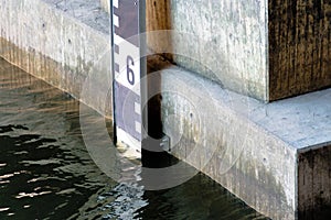 Detail view of a level for water level measurement at the Alster in Hamburg