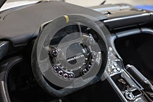 Detail View of the Steering Wheel with Integrated Controls of Dallara Stradale IR8 Tribute Italian Car
