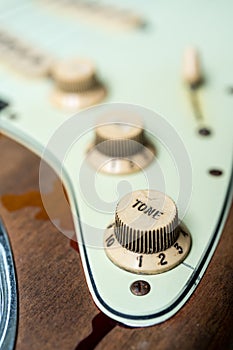 Detail of vintage electric guitar tone knob