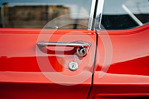 Detail of a vintage red car