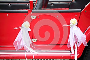 Detail of vintage red car door