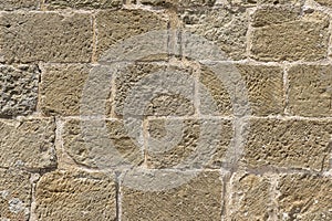 Detail of Wall built with blocks of hand carved stone