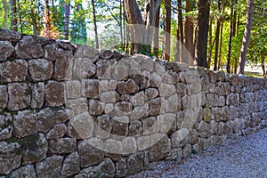 Detail of a wall built of rough stones.