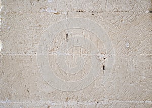 Detail of a wall made of white limestone bricks