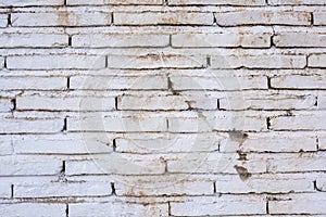 Wall made with white stained bricks photo