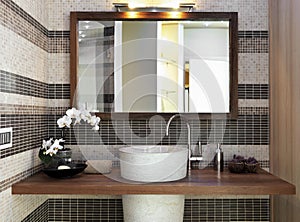 Detail of washbasin in modern bathroom photo