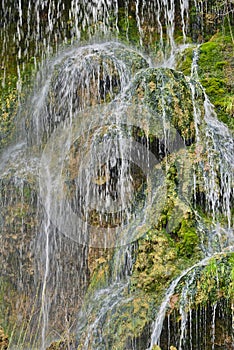 Detail of the waterfall with thermal water from Toplita, Romania