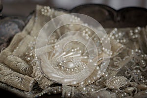 A Detail Of Wedding Lace and Dress Decoration Closeup