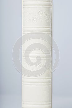 Detail of Wedding photobooks in white leather binding. Photo books with embossing and a cover of genuine leather.