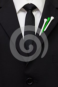 The detail of wedding suit with golf design.