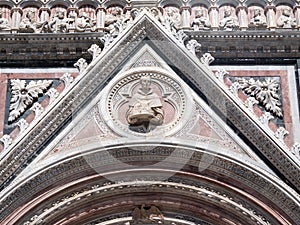 Detail of west facade of Siena Cathedral