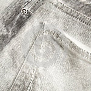 Detail of white-gray jeans close up