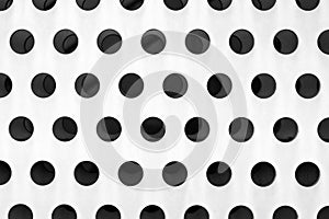 Detail white perforated metal facade