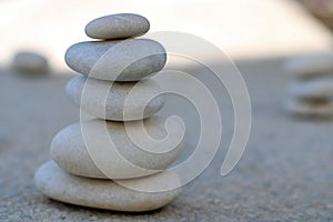 Detail of white piled stones. Balance and relaxation Concept