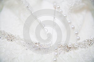 Detail of a white wedding dress close-up