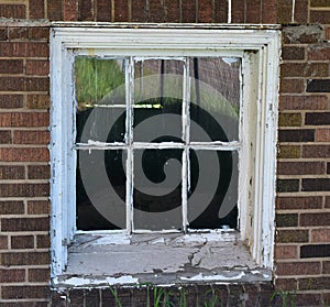 Detail of window in abandoned school