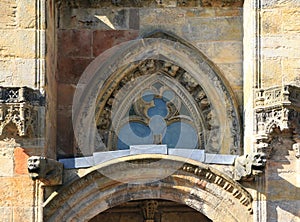 Detail of the window above a side door at Rosslyn Chapel