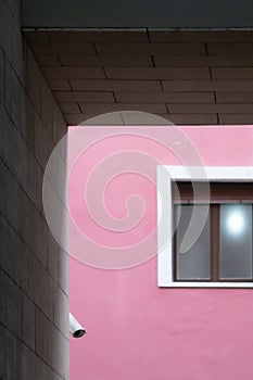 Detail of a window and a security camera near the El Buho restaurant in Pamplona