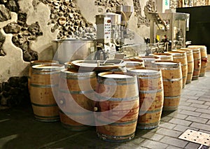 Detail of wine barrels in a wine cellar.