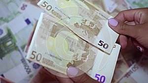 Detail of woman hands with euro money