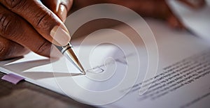 Detail of woman hands signing business document