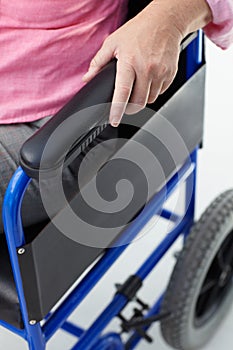 Detail of woman in wheelchair