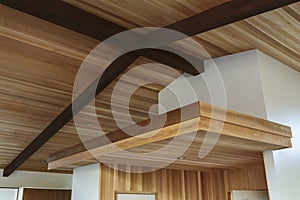 Detail of wood beam ceiling in a modern house entryway