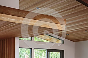 Detail of wood beam ceiling in a modern house entryway