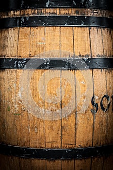 Detail of wooden barrel with metal hoops.