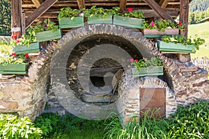 Detail of the wooden house typical in a alps village on Ridnaun Valley/Ridanna Valley - Racines country - near Sterzing/Vipiteno,