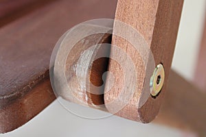 Detail of wooden movable joint of the chair armrest