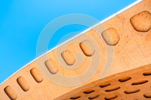 Detail of wooden roof with blue sky