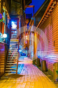 Detail of a wooden street in the historical district Bryggen in Bergen, Norway....IMAGE