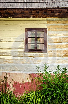 Detail of wooden window on old traditional house