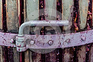 Detail of wooden wine press for pressing grapes