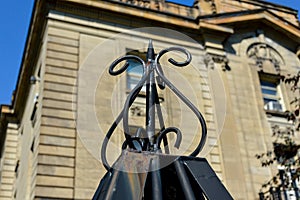 A detail of the wrought iron fence