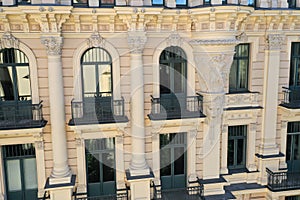 Detail of yellow art nouveau building facade of building in