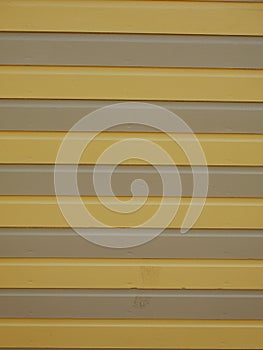 Detail of Yellow and Grey Striped Beach Hut