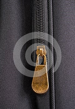 Detail of a zipper on a guitar bag, close up shot