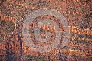 Detailed abstract of layered Grand Canyon cliffs.